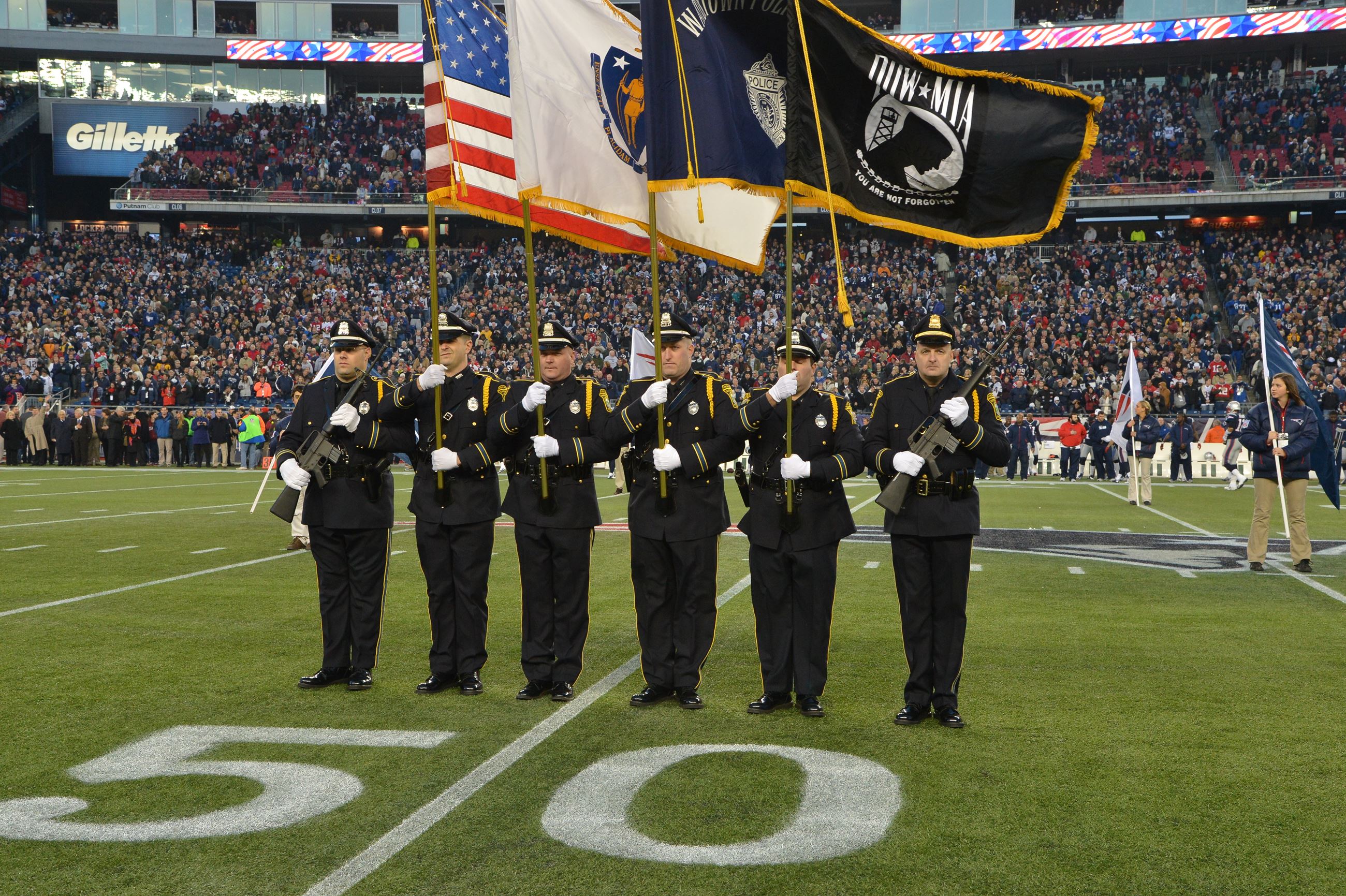 Honor Guard at an NFL Game with Flags