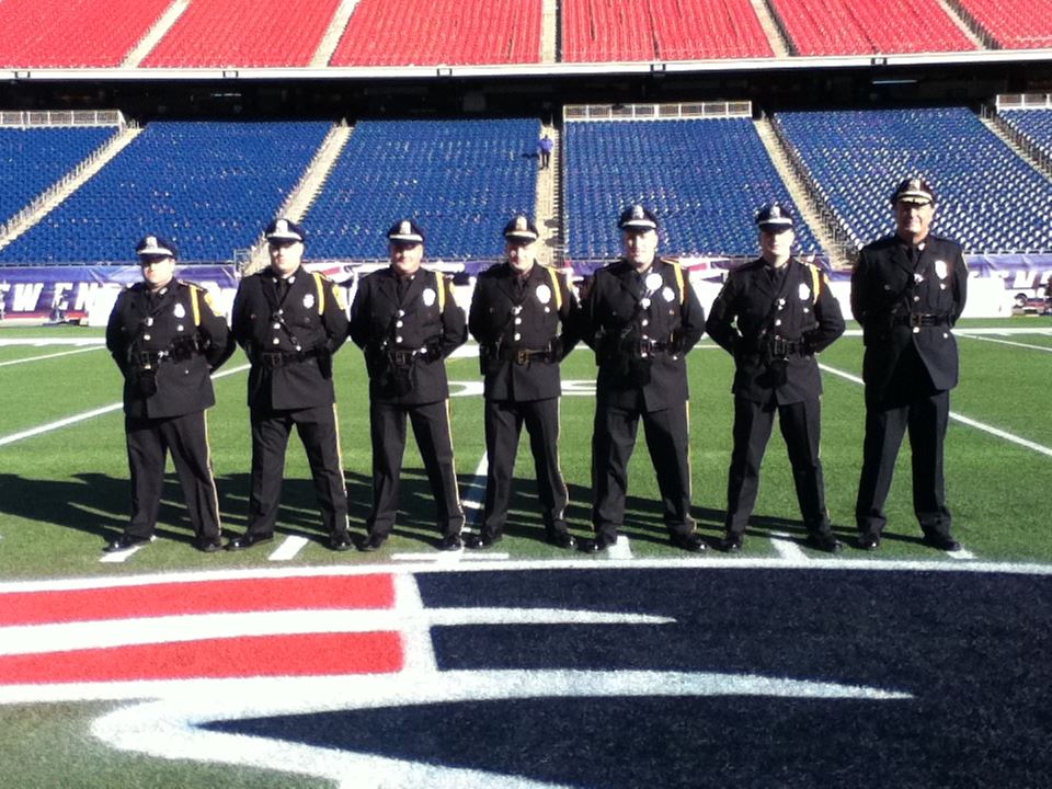Honor Guard Standing on a Football Field