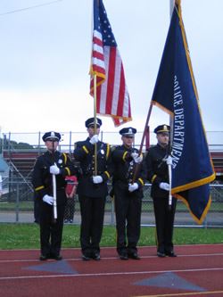 Honor Guard Standing on a Track
