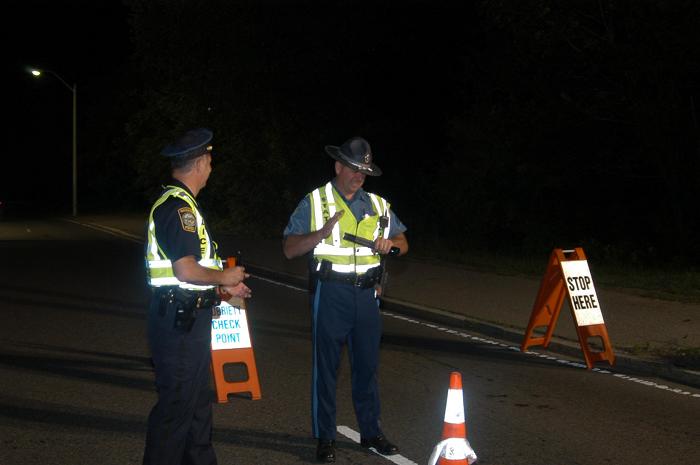 Police officers talking to each other.